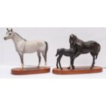 A Beswick Connoisseur model 'Black Beauty and Foal' on wooden base, 20cm high,