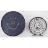 A Hardy 'St Andrew' 4 inch alloy fly reel, ebonised handle, tension screw to rim and alloy foot,