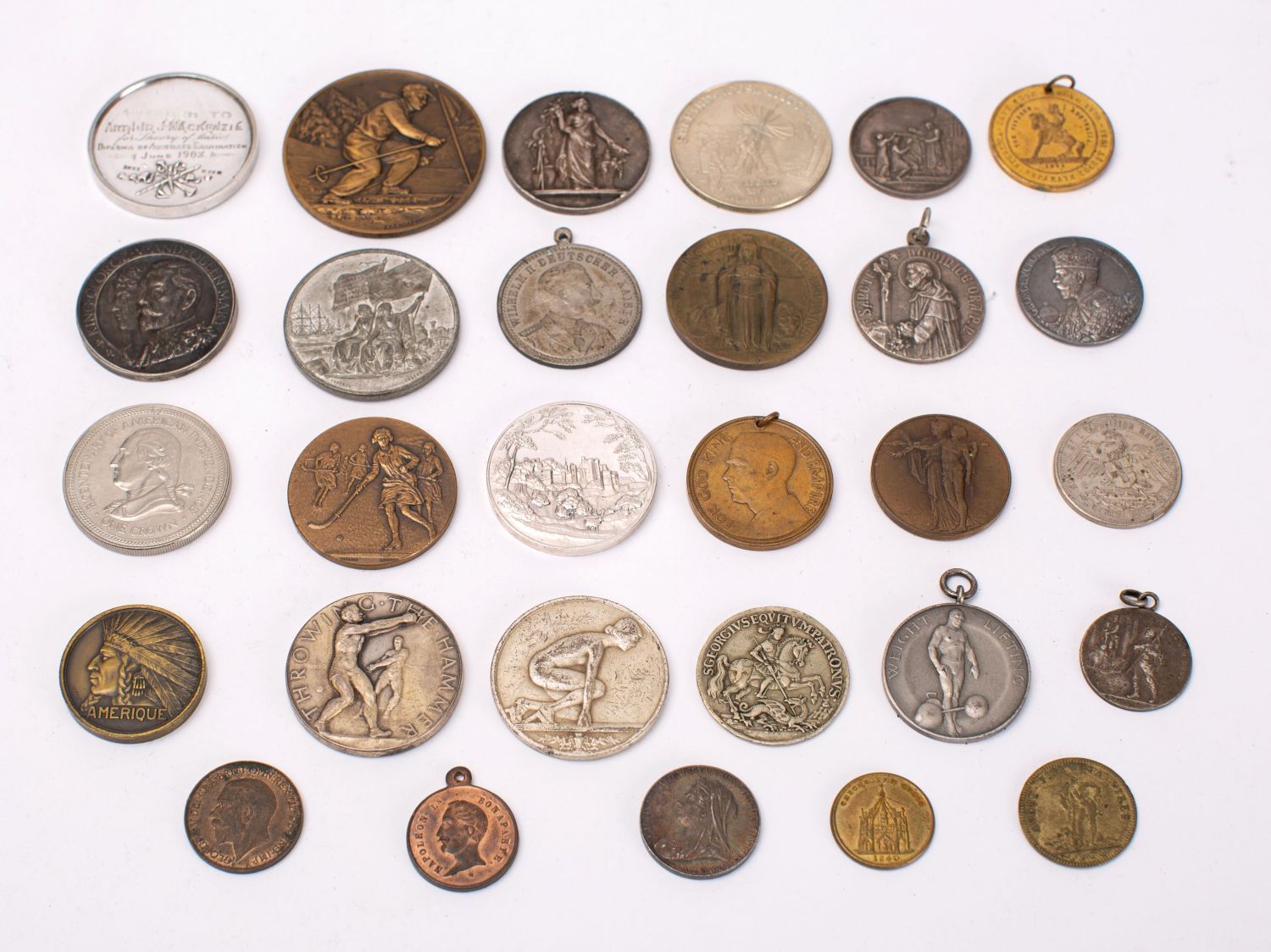 A mixed group of silver and base metal tokens,