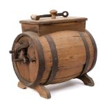 A coopered butter churn with iron mechanism and detachable handle,