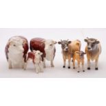 A group of Beswick cattle comprising Hereford cow, Hereford bull Champion of Champions,