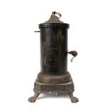 A 19th Century Continental clockwork spit engine in cylindrical blackened metal casing surmounted