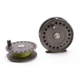 A Hardy 'St John' 3 7/8ths fly reel, single black handle, line tensioner and brass foot,