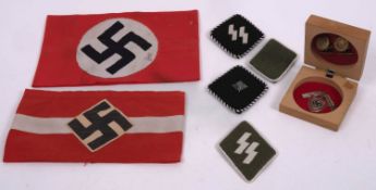A pair of German RAD cufflinks and badge, together with two NSDAP arm bands,
