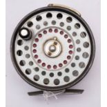 A Hardy 'Zenith' 3 inch alloy fly reel stamped as per title with single ebonised handle,