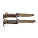 Two US M4 pattern fighting knives, one with rectangular hilt and wooden grip,