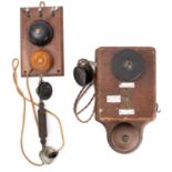 An Ericsson wall mounted railway telephone in oak case,