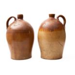 A pair of stoneware two gallon wine jars for 'Evans Wine & Spirit Merchant Newton (Bushell)' (2)