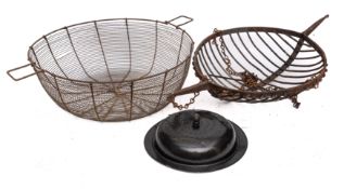 A Continental circular iron twin-handled basket spit with suspension chains, 41cm diameter,