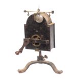 A 19th Century Continental clockwork spit engine of domed outline with brass governor and bell