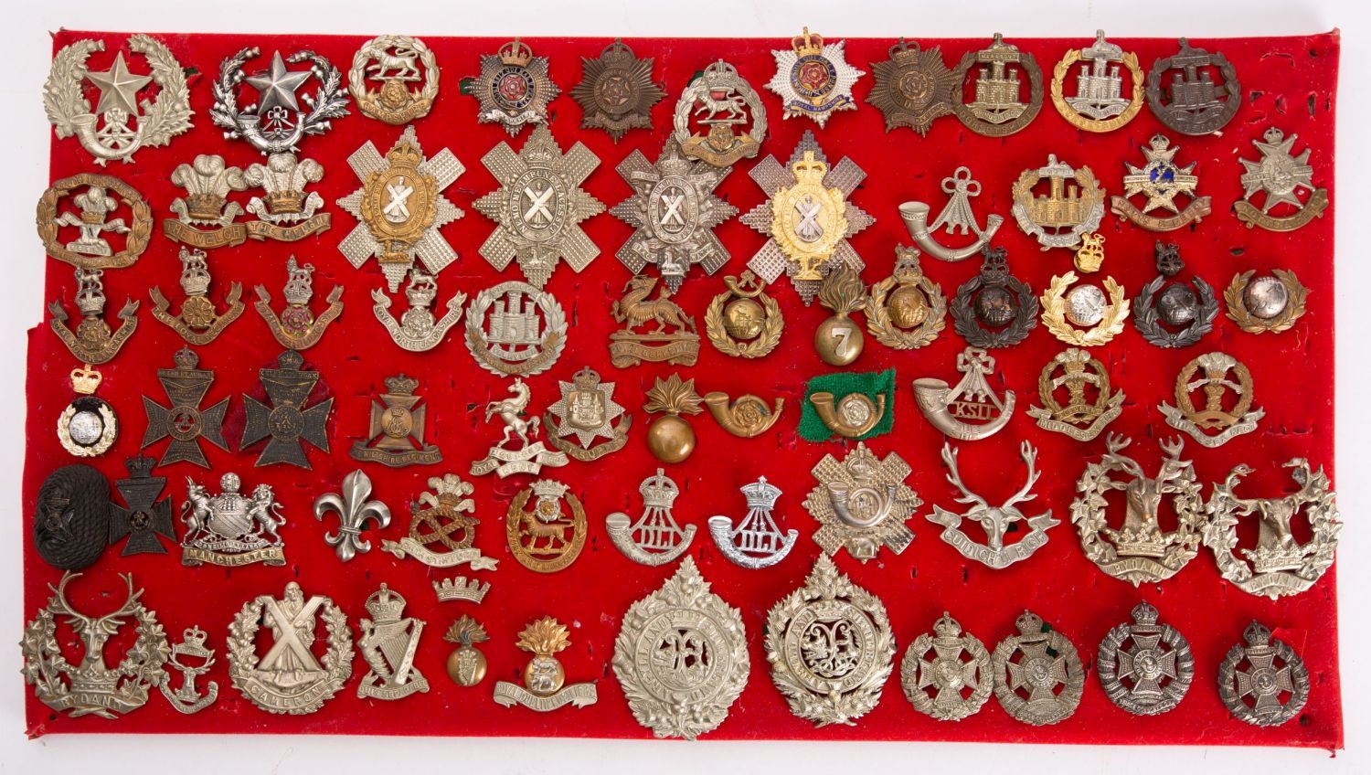 A collection of British Infantry Regiment cap badges, including Prince Consorts Own,