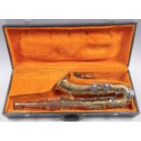 A Melody Maker brass and nickel plated tenor saxophone in fitted case.