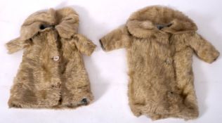 Two late 19th/ early 20th century doll's white fur coats, both with mother of pearl buttons,