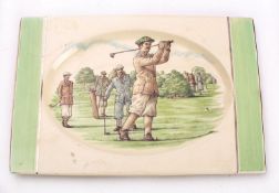 A Clarice Cliff Biarritz plate of 'Victorian Golfers' pattern,