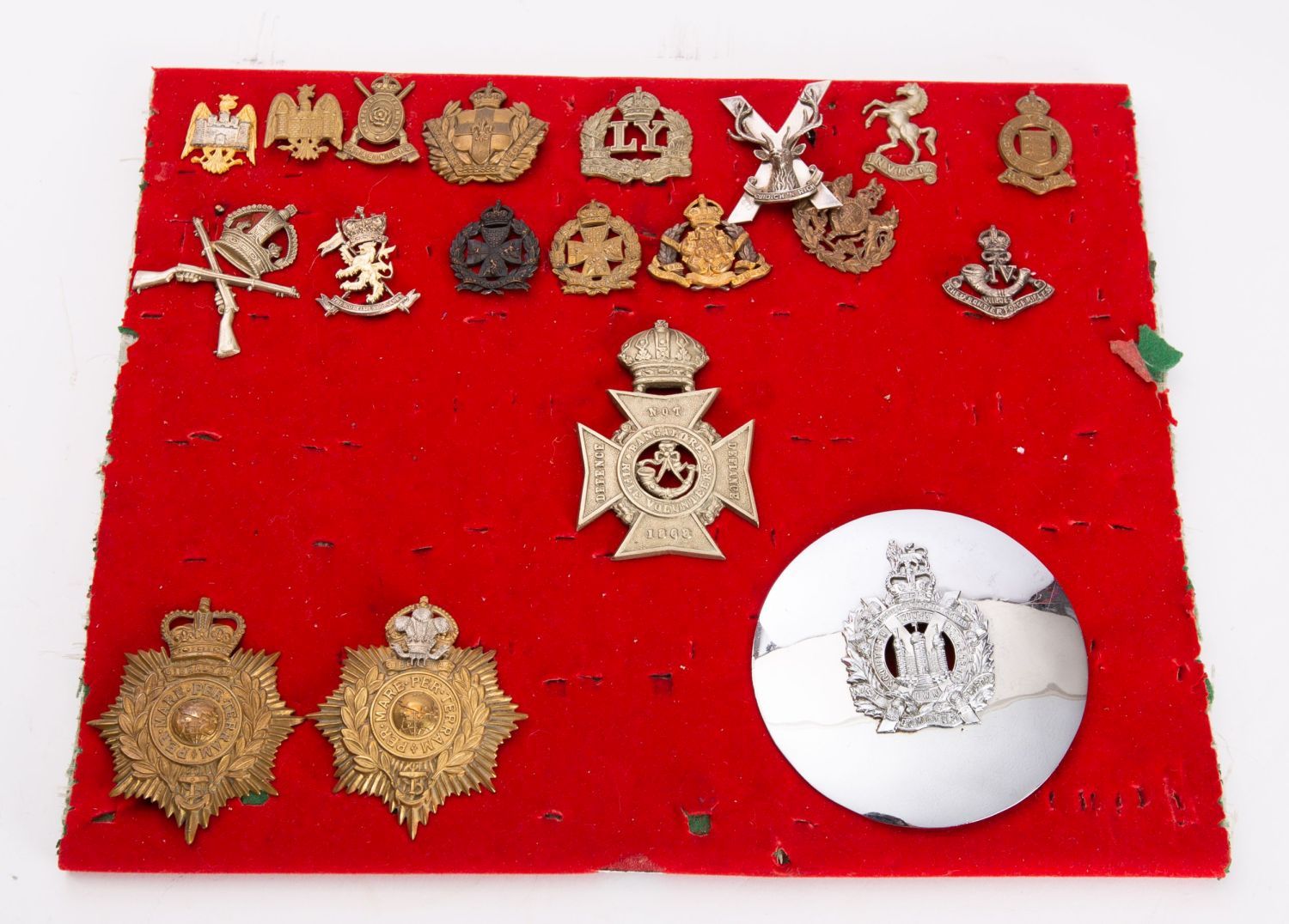 A collection of British Yeomanry and other Regimental cap badges including Inns of Court Regiment,