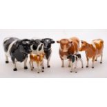 A group of Beswick cattle comprising;- Friesian cow, Champion Claybury Leegwater, Friesian bull,