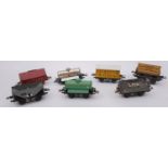 An unboxed group of Hornby O gauge rolling stock, comprising a Cement wagon,