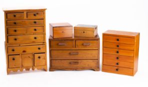 Three various table top collectors/specimen cabinets and two other miscellaneous boxes.