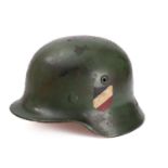 A WWII period M1942 pattern Youth's Stahlhelm green with National colours to one side and applied