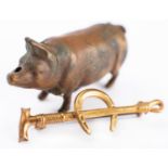 An early 20th century small brass pig vesta case, 5cm long,