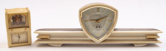 A mid 20th century Goldbuhl (Germany) white plastic musical alarm clock in the form of a television,