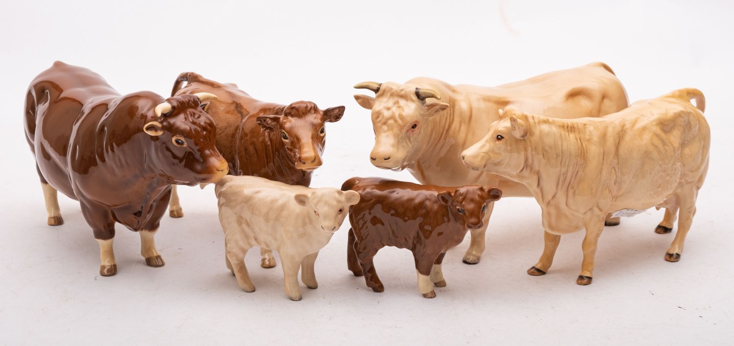 A group of Beswick cattle comprising a Charolais cow,