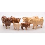 A group of Beswick cattle comprising a Charolais cow,