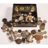 A collection of mixed coins including 1858 penny and two Magic Savings bank tins.