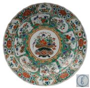 A Chinese famille verte charger with shaped rim,