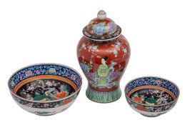 A Japanese famille rose vase and cover and a graduated pair of similar bowls painted with bijin,