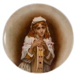 A pottery charger, probably Kensington Gore, hand painted with a female musician,