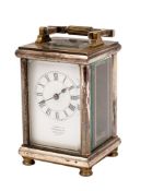 An Edwardian French carriage clock having an eight-day duration timepiece movement with a cylinder