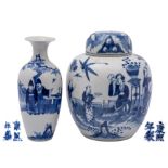 A Chinese blue and white oviform jar and cover and a baluster vase, late Qing Dynasty,