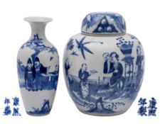 A Chinese blue and white oviform jar and cover and a baluster vase, late Qing Dynasty,