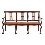 A South African hardwood and canework chair-back settee in 18th century style,