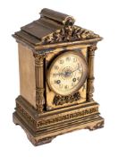 A French Victorian brass mantel clock the eight-day duration movement having a platform lever