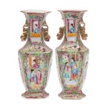 A pair of Canton hexagonal-section baluster vases with gilt lion dog handles, Qing dynasty,