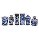 A group of five small Chinese blue and white vases together with a caddy and cover,