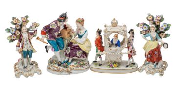 Four Continental 'gold anchor' porcelain figures, comprising a pair of dancing shepherds,