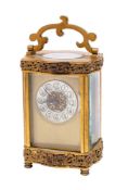 An Edwardian French carriage clock the eight-day duration timepiece movement having a platform