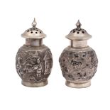 A pair of Chinese silver pepperettes by Luen Wo,