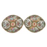 A pair of Canton monogrammed shaped oval dishes the monogram in gilt edged iron-red, Qing Dynasty,