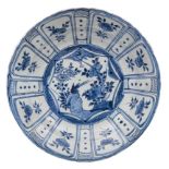 A Chinese 'Kraak' blue and white dish painted with a bird,