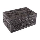A Sri Lankan carved ebony and bone inset casket, 19th century, of hinged rectangular form,
