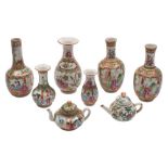 A pair of small Canton bottle vases together with three similar vases and two miniature teapots and