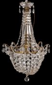 A gilt metal and cut glass chandelier in Regency style,