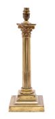 A brass Corinthian column table lamp: with foliate capital and stop fluted column on a stepped