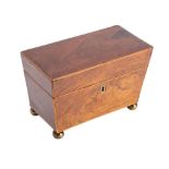 A late George III walnut, sycamore strung and brass mounted tea caddy, circa 1800,