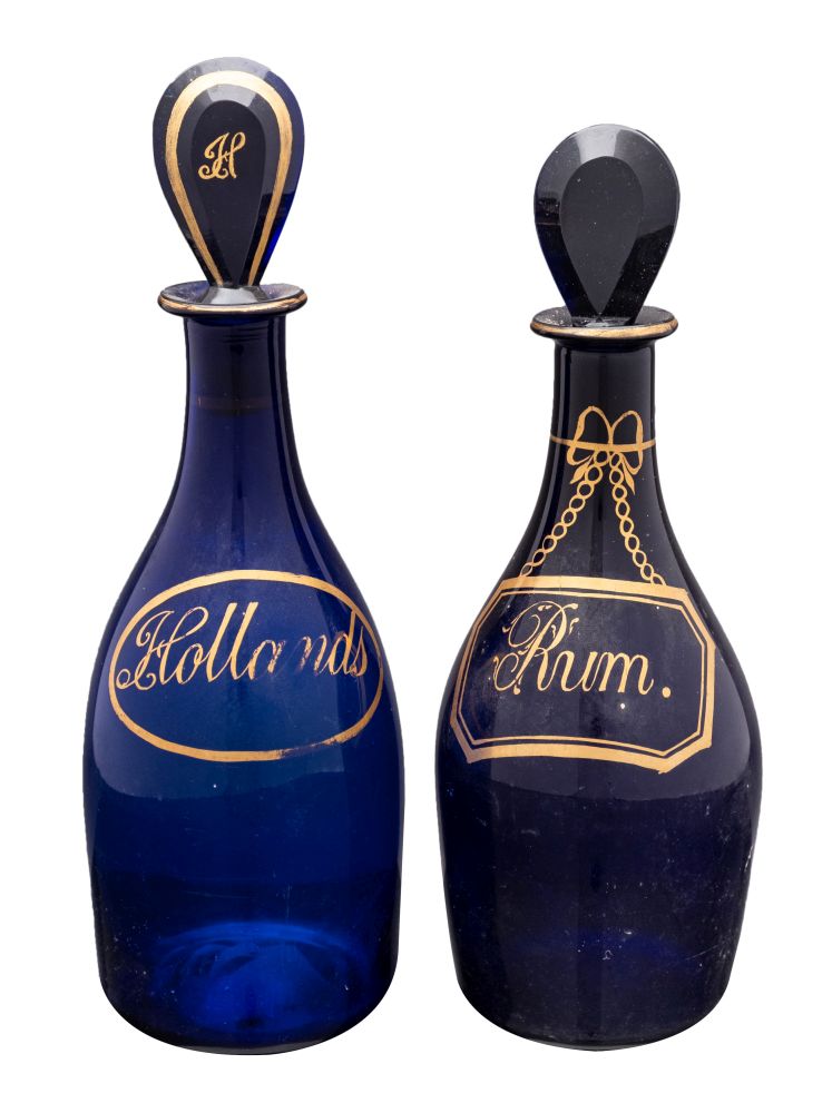 Two 'Bristol Blue' mallet shaped decanters,