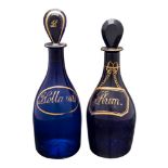 Two 'Bristol Blue' mallet shaped decanters,